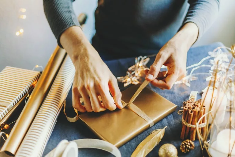 Christmas gift bags with ribbons are traditional choice