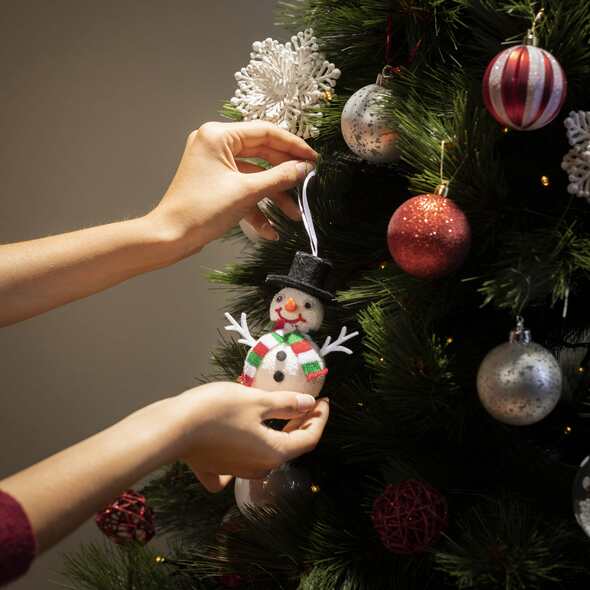 One of the most exciting parts of decorating a Christmas tree is hanging ornaments