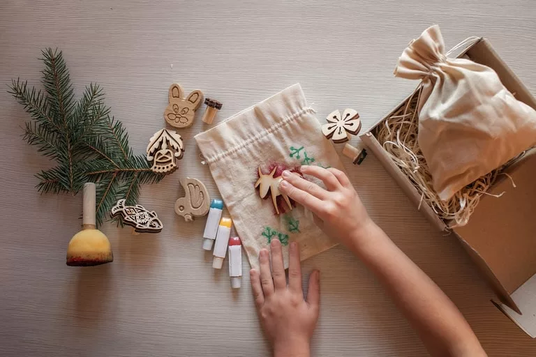 Using stamps to create beautiful patterns on Christmas gifft bags