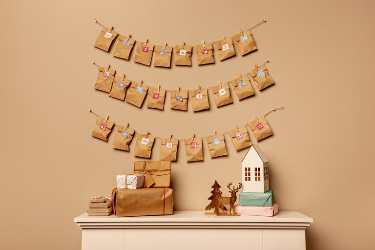 Advent calendar of Kraft bags and decorating tape 