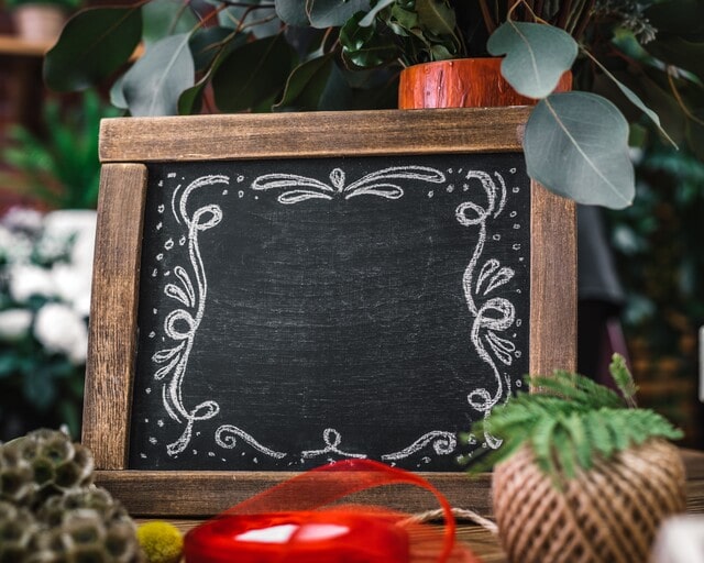 Create a festive menu board with a mini chalkboard