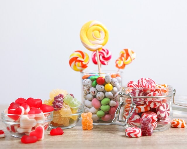 Use various kinds of candies in Candy Land first birthday theme