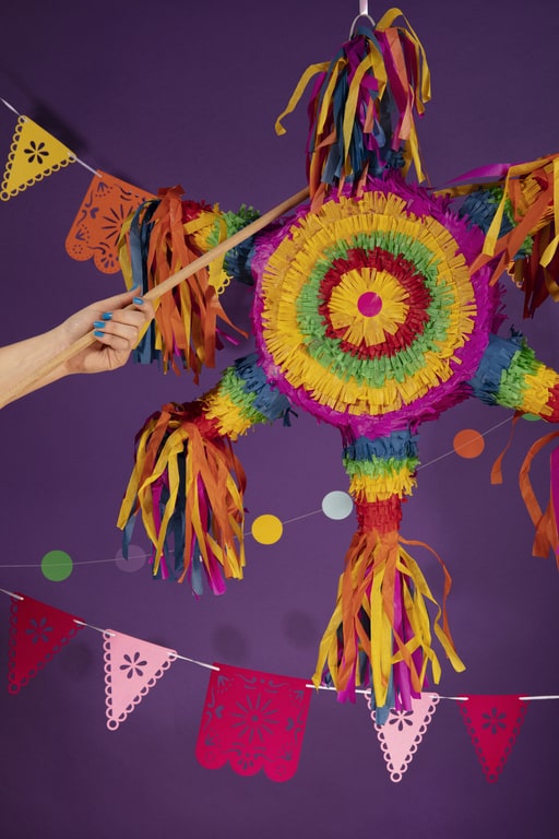 Hang a piñata at the center of a Mexican themed party