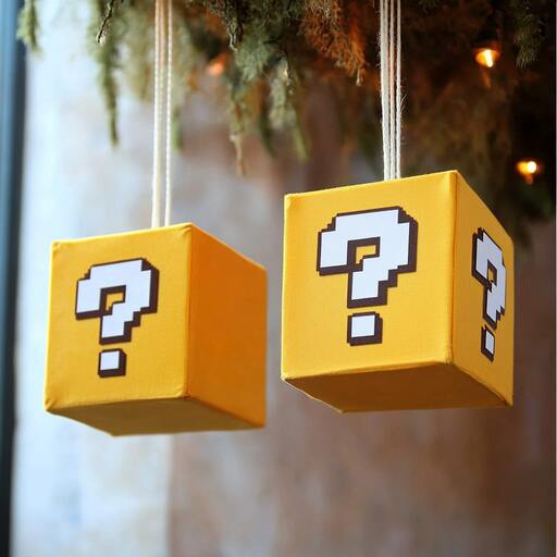 Hang question block cutouts from the ceiling