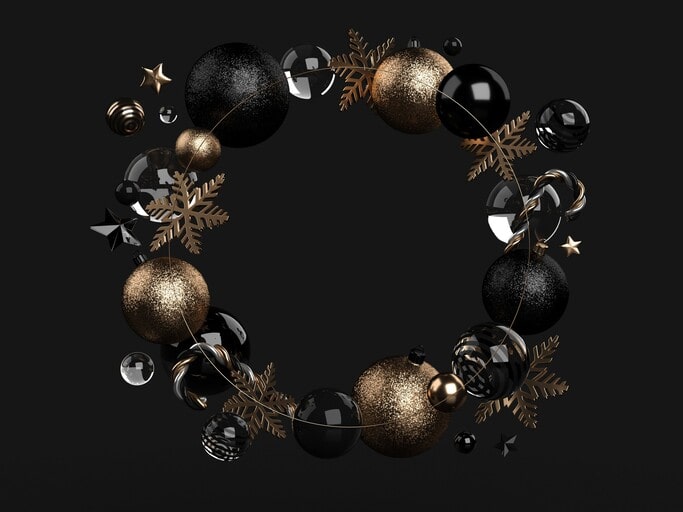 Dark velvet baubles and minimalist metallic accents are the suitable decorations