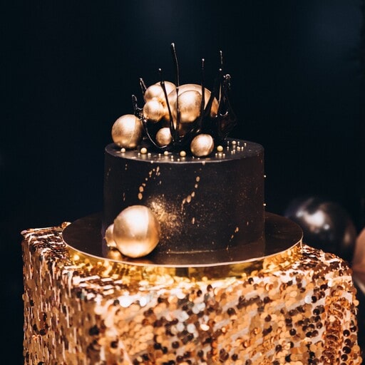 Turning 50? 25 Memorable 50th Birthday Party Ideas to Make It Count 4 Black and Gold Cake