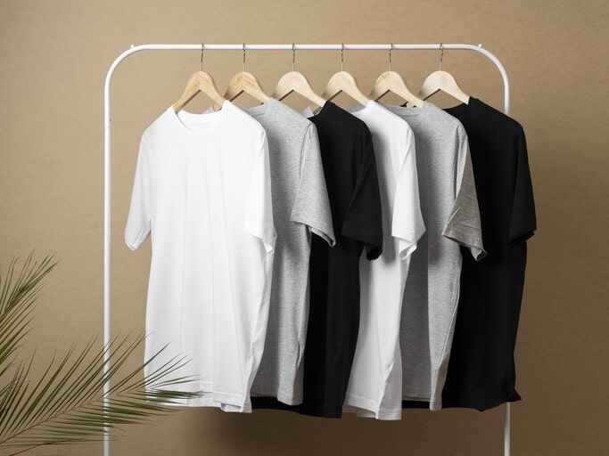 Hang clothings with DTF transfers to keep the prints from cracking