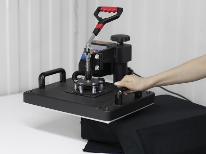 Heat press machine with adjustable temperature and timer controls