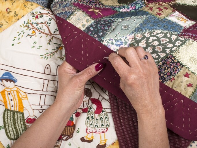 Gift for Mother in Law: 23 Best Ideas to Show Your Appreciation 2 A handmade stitched quilt