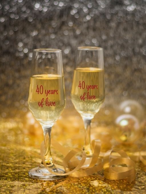 18 Meaningful 40th Wedding Anniversary Gift Ideas for Parents 4 Customized champagne flutes