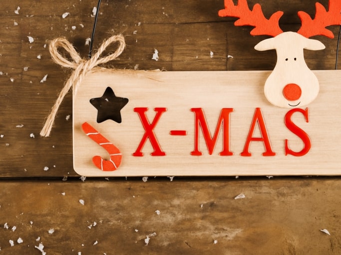 Christmas-themed Welcome Sign using UV DTF transfer stickers