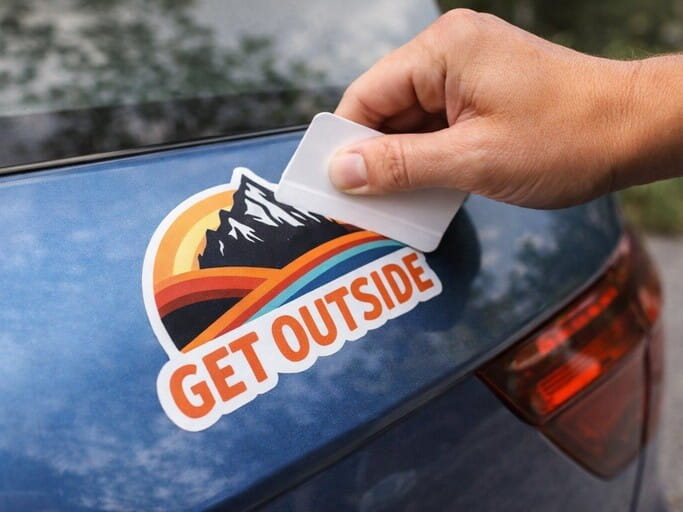 Smooth out the air bubbles using a card