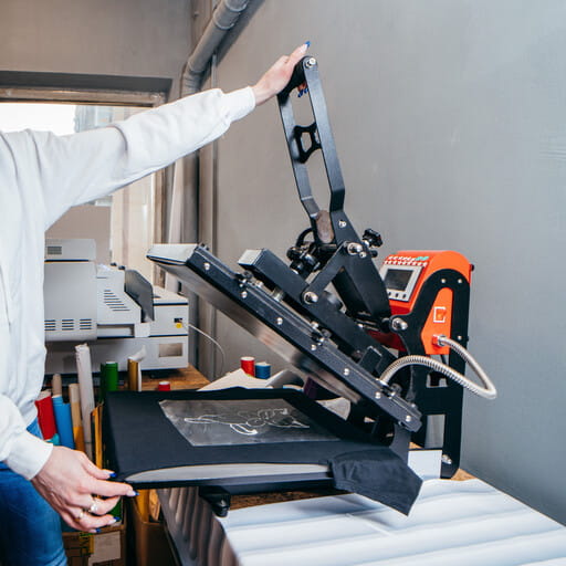 A heat press machine for applying DTF Transfers